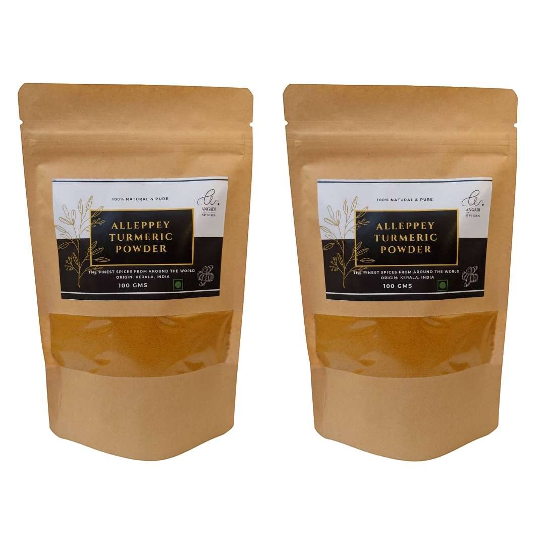 Angadi of Spices Authentic Alleppey Turmeric Powder in resealable brown pouches, 100g each, with a clear window showing the vibrant yellow spice.