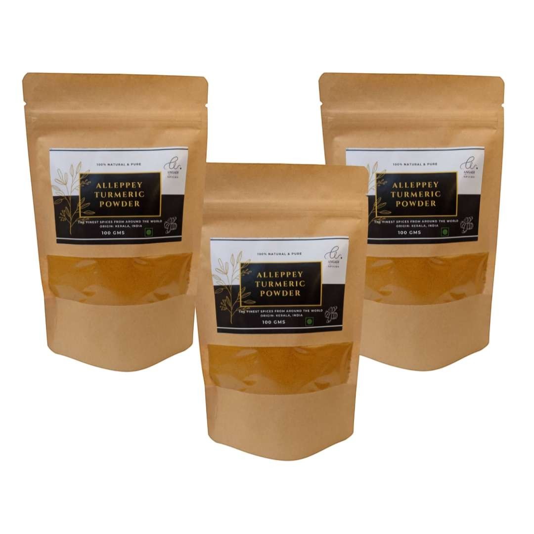 Angadi of Spices Authentic Alleppey Turmeric Powder in resealable pouches, vibrant yellow spice for cooking and wellness.