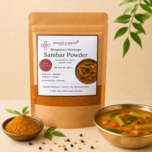Angadi of Spices Bengaluru Heritage Sambar Powder, a traditional South Indian spice blend in a brown pouch with a picture of sambar.