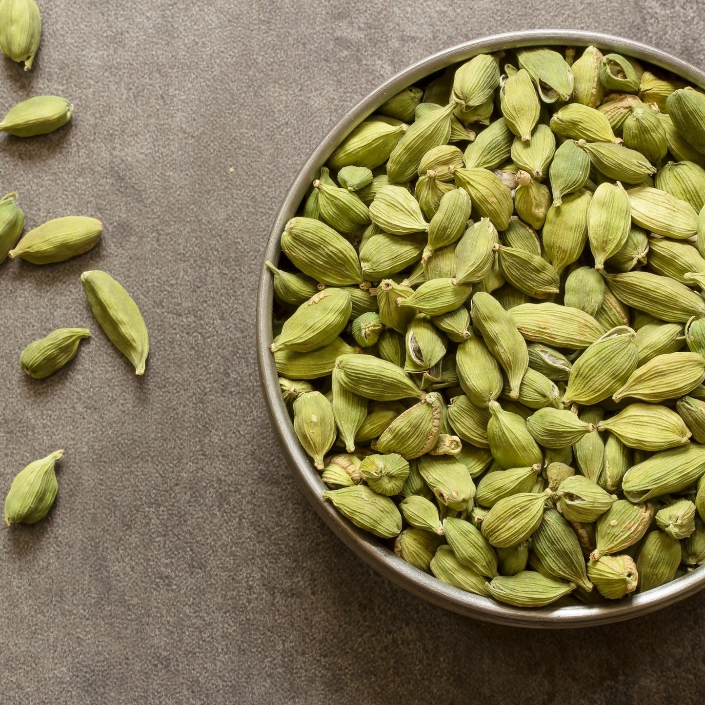 Angadi of Spices premium 8MM whole green cardamom pods (elaichi) with a bold aroma, perfect for cooking and baking.