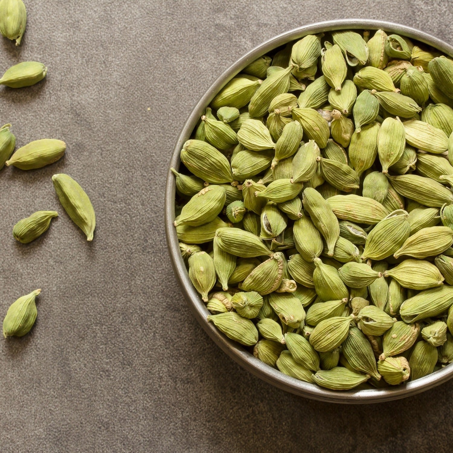 Angadi of Spices premium 8MM whole green cardamom pods (elaichi) with a bold aroma, perfect for cooking and baking.