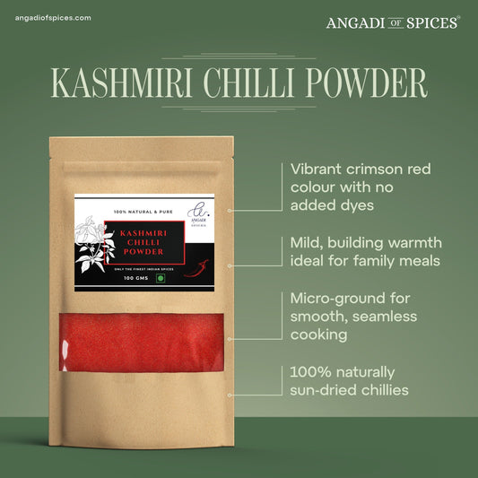 Angadi of Spices Kashmiri Chilli Powder in a brown pouch, vibrant crimson red with mild pungency, 100% natural and sun-dried.