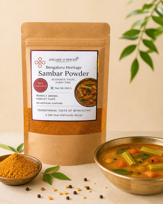 Angadi of Spices Bengaluru Heritage Sambar Powder, a traditional South Indian spice blend in a brown pouch with a picture of sambar.